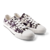 Lustige Canvas-Schuhe Schwarze und weiße Flecken